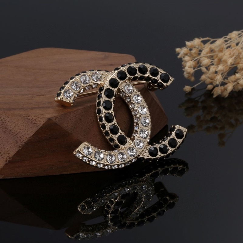 Ch**el brooches